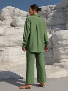 Women's green long-sleeve shirt and wide-leg trousers two-piece set, back detail view.
