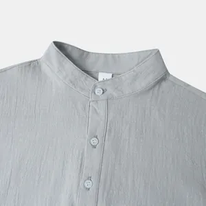 Close-up detail of a men's breathable cotton linen shirt with a stand-up collar