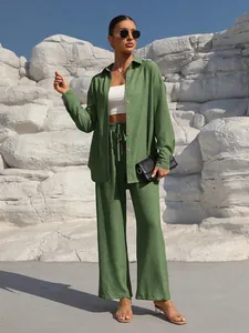 Detail showing full-body fit and styling of the sage green casual two-piece set