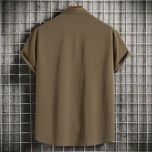 Back view of a casual men's summer short-sleeve shirt in textured khaki brown fabric
