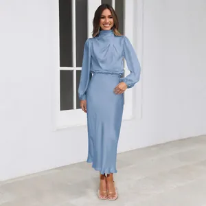 Elegant dusty blue satin long-sleeved maxi dress for women featuring a high neckline.