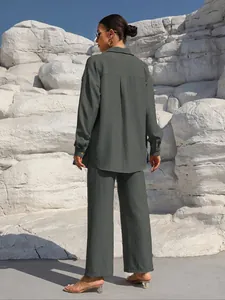 Detailed back view of women's dark grey two-piece lounge set in textured crepe fabric