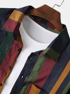 Close-up of a men's multi-colored vertical striped shirt with cotton linen texture