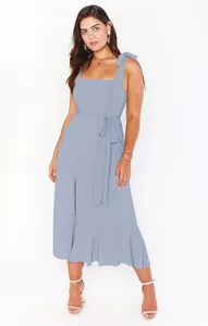 Full length view of light blue French style slit midi dress with tie shoulder straps