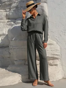 Women's chic moss green two-piece set featuring long-sleeved shirt and wide-leg pants