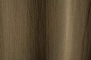 Macro view showing the crinkled texture of khaki fabric for men's summer short shirt