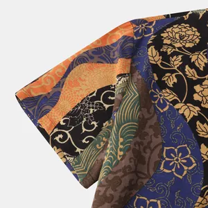 Detailed close-up of vibrant Hawaiian floral and wave print on men's short-sleeved shirt