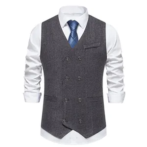 Detail view of men's double-breasted herringbone suit vest in charcoal grey.