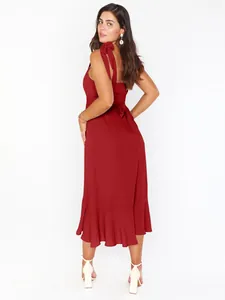 Elegant red French style midi dress featuring shoulder ties and a ruffled hem detail