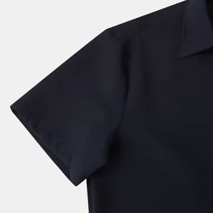 Close-up detail of navy blue short-sleeved men's shirt showing fabric texture