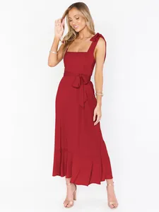Full length photo of an elegant wine red square neck midi dress with a tie waist