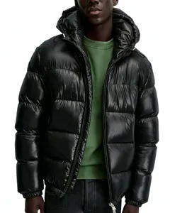 Close-up detail of a men's glossy black hooded puffer jacket in a classic American casual style.