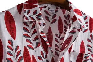 Close-up view of a men's casual short-sleeve shirt with a red leaf pattern detail