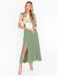 Elegant sage green tie-shoulder midi dress with front slit and ruffle hem