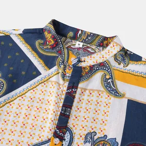 Close-up detail of paisley printed summer shirt with mandarin collar and size M tag