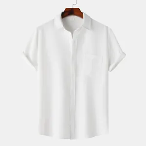 Macro view of white waffle knit short sleeve men's shirt with chest pocket detail