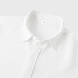 Macro detail view of white waffle texture men's short sleeve casual shirt collar