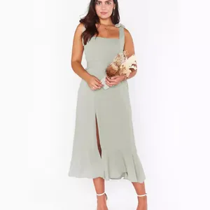 Elegant sage green French style midi dress with front slit and ruffle hem for summer