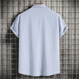 Detailed back view of a loose light blue men's short-sleeved casual shirt with collar
