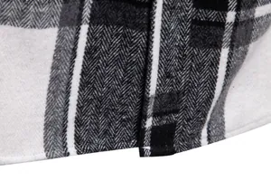 Primer plano de la tela de camisa de cuadros gruesa para hombre con patrón de espiga.