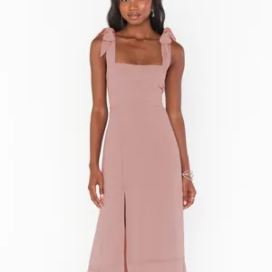 Elegant French-style dusty rose slit midi dress with square neck and chic bow straps.