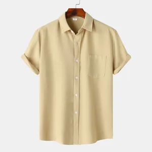 Close-up detail of yellow short sleeve waffle knit button-down casual shirt for men