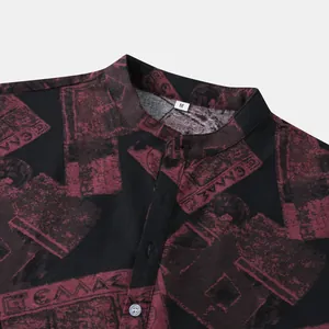 Detailed view showing the stand-up collar and abstract print on this men's casual shirt.