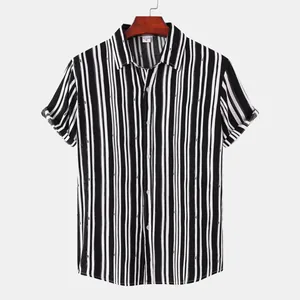 Detailed view of men's short sleeve shirt with black and white vertical stripes