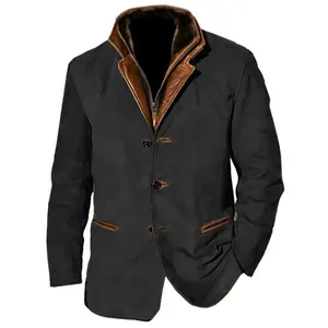 Close-up of vintage men's workwear jacket with brown leather trim and button detail