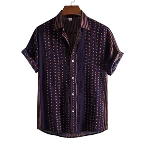 Detail shot of men's casual short-sleeved shirt with orange polka dots and stripes