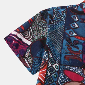 Macro view of ethnic geometric print on a men's short-sleeved summer shirt