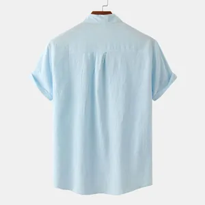 Back view of light blue men's cotton linen shirt with stand collar and rolled sleeves