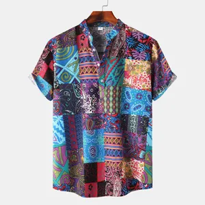 Detailed view of men's short sleeve shirt featuring vibrant colorful patchwork patterns