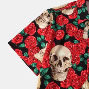 Close-up of men's Halloween shirt with gothic skull and red rose pattern print.