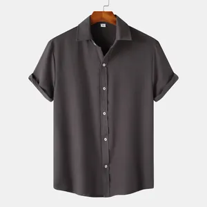 Professional close-up of a men's dark grey short-sleeve shirt with rich fabric texture details
