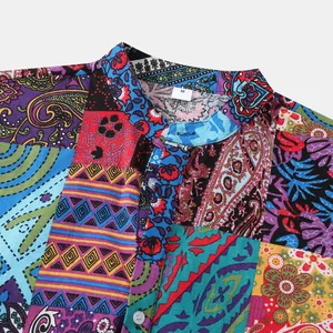 Detail of colorful patchwork paisley print on men's casual Hawaiian short sleeve shirt.