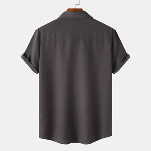 Back view of a charcoal grey textured short sleeve button-down shirt for men's summer style