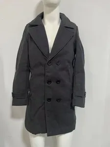 Detailed view of a charcoal grey double-breasted wool coat for men with a notched lapel