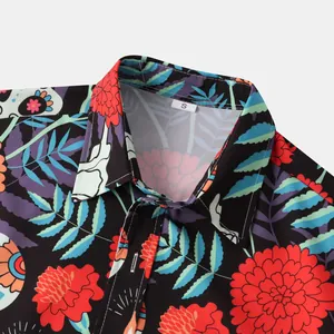 Detailed close-up of a Halloween themed floral printed shirt collar with size S tag