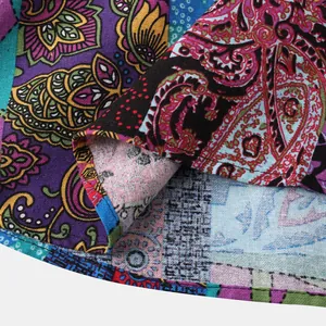 Close-up of vibrant paisley patchwork fabric on a men's Hawaiian shirt