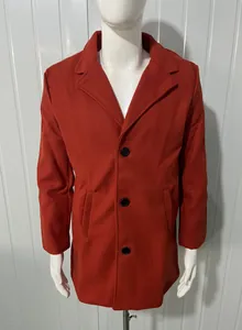 Premium men's thick mid-length wool overcoat in rust red displayed on a mannequin.