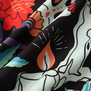 Close-up of vibrant Halloween themed print detail on casual men's beach shirt fabric