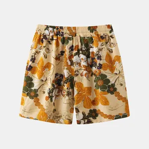 Detailed view of men's floral beach shorts featuring a vibrant tropical flower print design.
