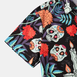 Macro view of the Halloween sugar skull and floral print on men's beach shirt fabric