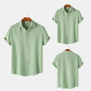 Detailed views of a men's light green crinkle texture short sleeve button-down shirt