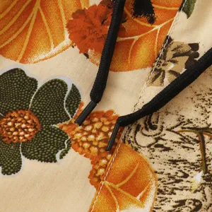 Macro detail of floral pattern cotton linen men's casual shorts with black drawstrings