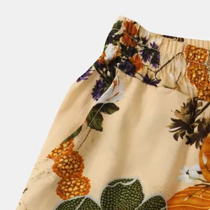 Detailed view of elastic waistband on tropical floral print cotton linen beach shorts