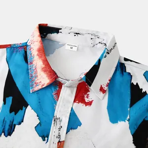 Close-up of men's abstract brushstroke print beach shirt collar and size tag