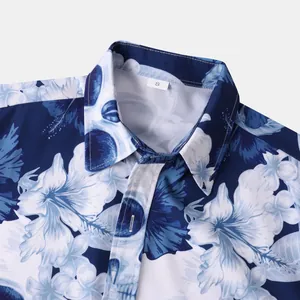 Close-up detail of men's Halloween beach shirt collar with floral and skull print