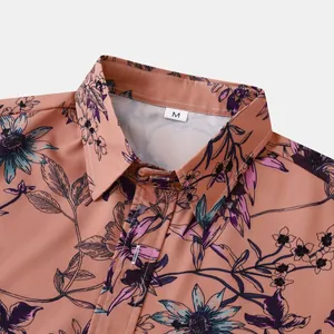 Detailaufnahme eines Herren-Freizeithemdes mit Blumenmuster, Kragen und Textur.